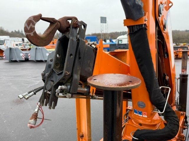 Camión portacontenedores de gancho Garant Abrollmulde mit HMF Kran + Funk