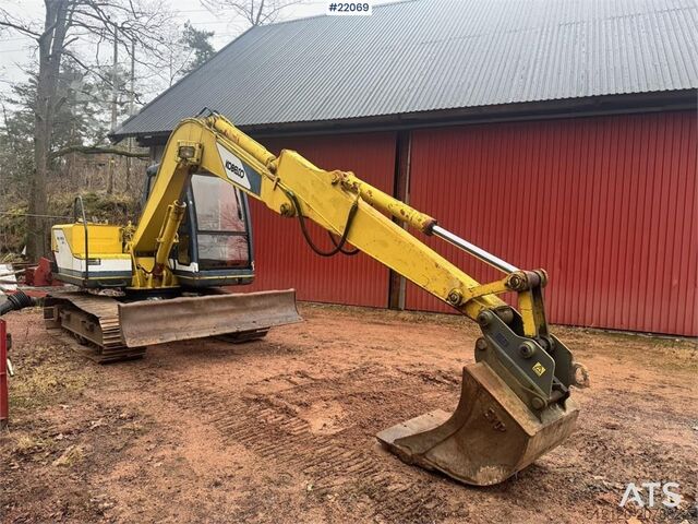 Rupsgraafmachine Kobelco SK60 crawler excavator with bucket
