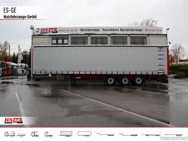 Avoin puoliperävaunu pressulla KÖGEL 3-Achs-Cargo-Coil-Pritschensattelanhänger