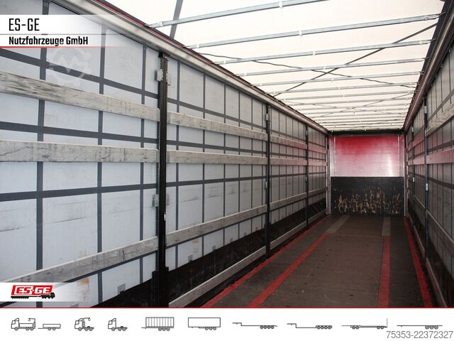 Avoin puoliperävaunu pressulla KÖGEL 3-Achs-Cargo-Coil-Pritschensattelanhänger