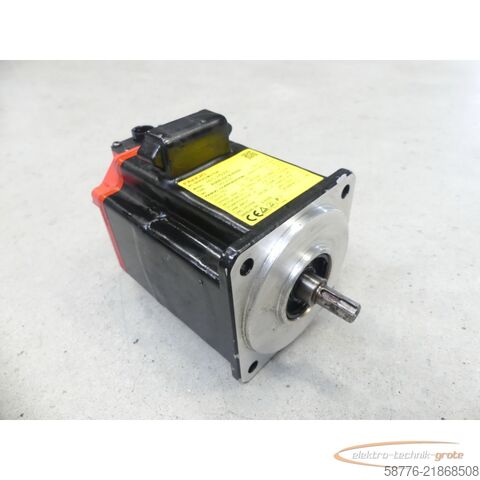 Fanuc A06B-0218-B200 AC Servo Motor SN: C148F2F0D mit A860-2000-T301 Pulsecoder