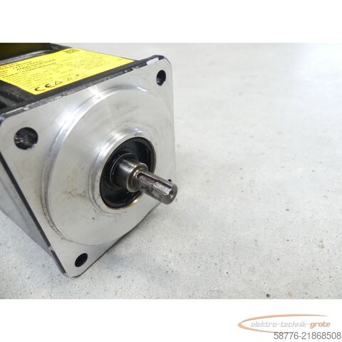  Fanuc A06B-0218-B200 AC Servo Motor SN: C148F2F0D mit A860-2000-T301 Pulsecoder
