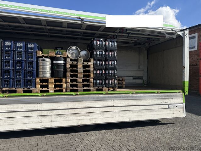 Flatbed truck with tarp IVECO Stralis AT