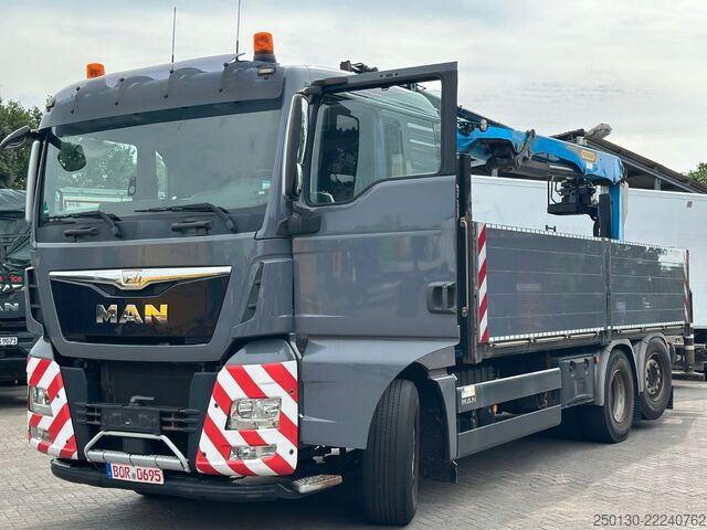 Flatbed truck MAN TGX 26.520 Baustoffpritsche PALFINGER