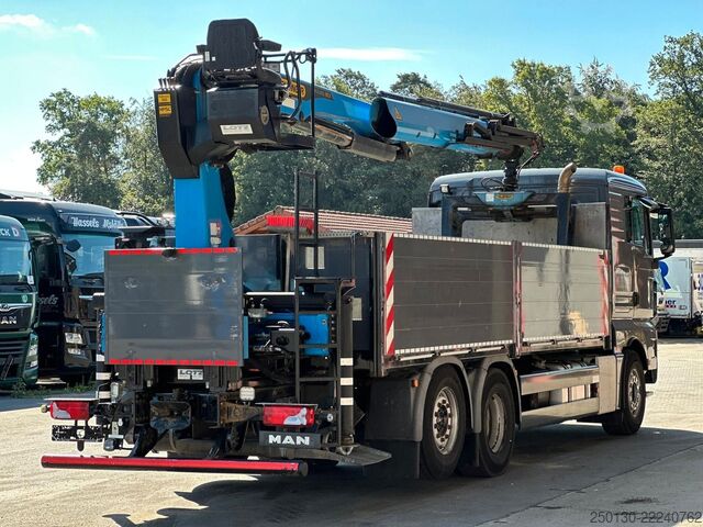 Flatbed truck MAN TGX 26.520 Baustoffpritsche PALFINGER