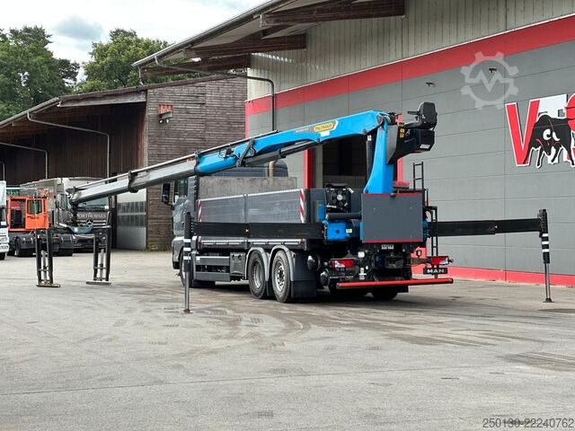 Flatbed truck MAN TGX 26.520 Baustoffpritsche PALFINGER