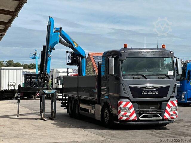 Flatbed truck MAN TGX 26.520 Baustoffpritsche PALFINGER