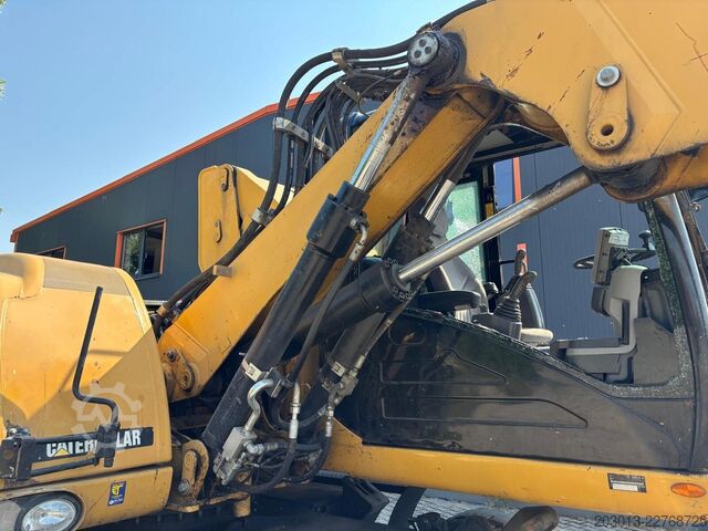 Ratinis ekskavatorius CATERPILLAR M313D Mobilbagger Hochfahr. Kabine