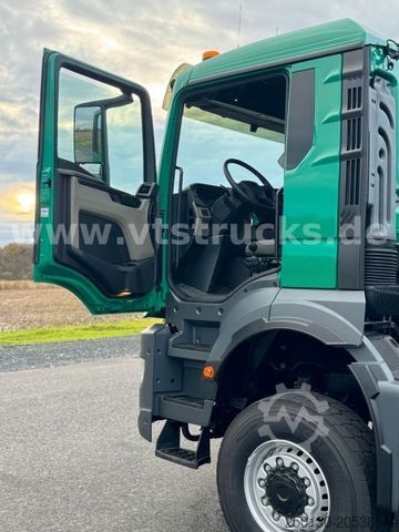 Kamion me krah të lëvizshëm për kontejnerë MAN TGS 33.480 6x6 BL HYVA-Abrollkipper *NEU*