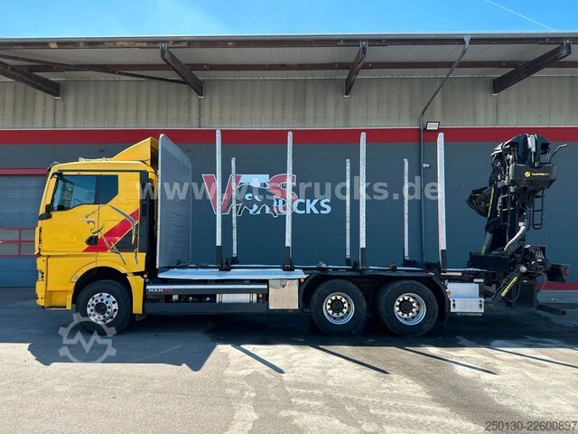 Autocarro forestale MAN TGX 33.580 6x4 BL PAVIC Holz & TAJFUN 130ZK