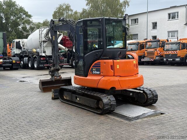 Paletli ekskavatör KOMATSU PC58MR-5E0 Tiltrotator OQ45-5 / 2.336 h