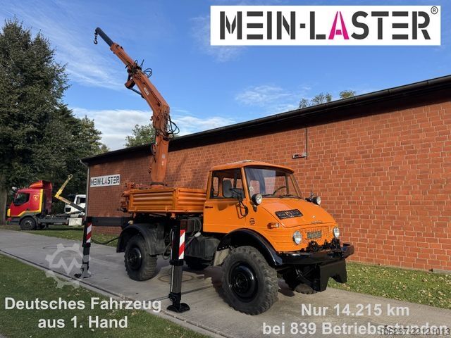 รถตู้เครนติดตั้งบนรถบรรทุก UNIMOG U 1100 Atlas AK 3006 nur 14.215 km-1. Hand