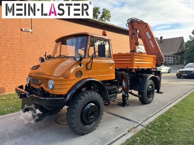 รถตู้เครนติดตั้งบนรถบรรทุก UNIMOG U 1100 Atlas AK 3006 nur 14.215 km-1. Hand