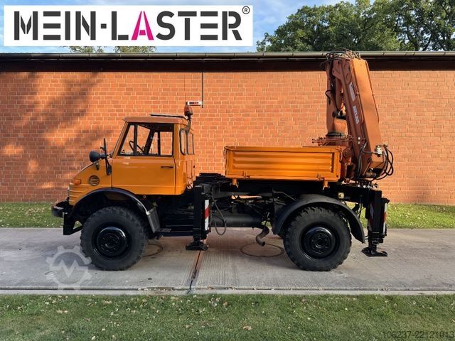 รถตู้เครนติดตั้งบนรถบรรทุก UNIMOG U 1100 Atlas AK 3006 nur 14.215 km-1. Hand