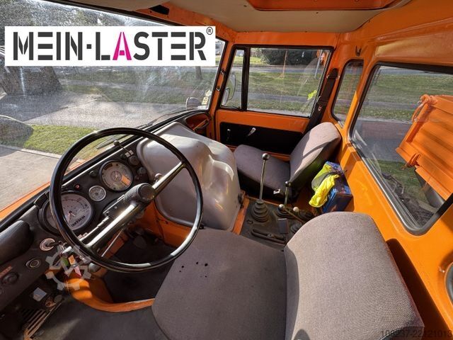 รถตู้เครนติดตั้งบนรถบรรทุก UNIMOG U 1100 Atlas AK 3006 nur 14.215 km-1. Hand