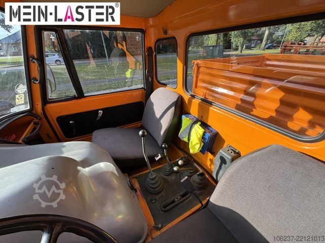 รถตู้เครนติดตั้งบนรถบรรทุก UNIMOG U 1100 Atlas AK 3006 nur 14.215 km-1. Hand