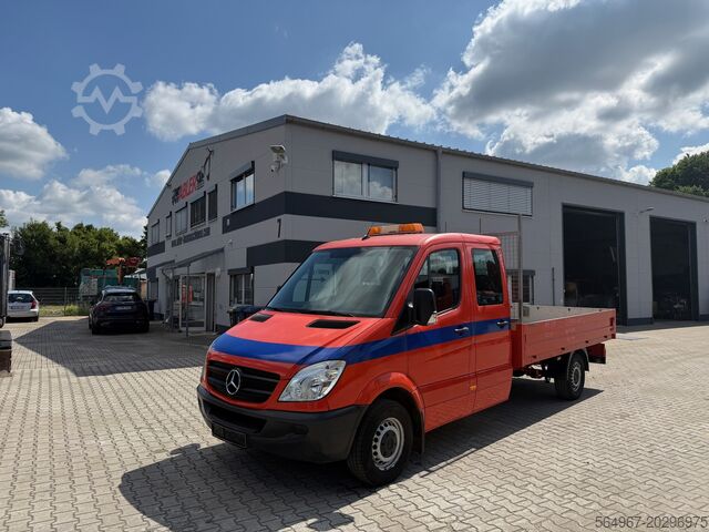 Platform truck Mercedes-Benz 311 Sprinter Pritsche DOKA AHK