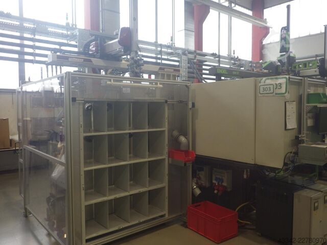 Máquina de moldeo por inyección con robot DEMAG InElect 150/520-410