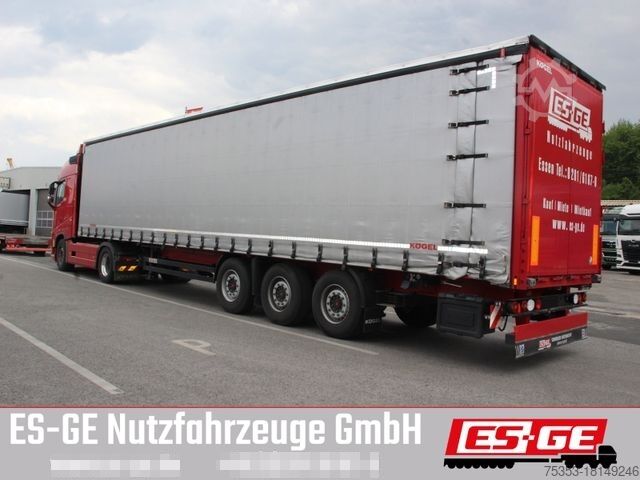 Open semitrailer with tarp KÖGEL 3-Achs-Cargo-Coil-Pritschensattelanhänger