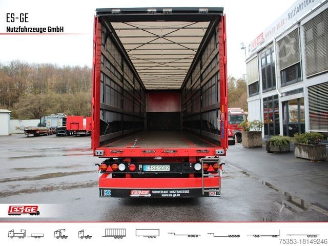 Open semitrailer with tarp KÖGEL 3-Achs-Cargo-Coil-Pritschensattelanhänger