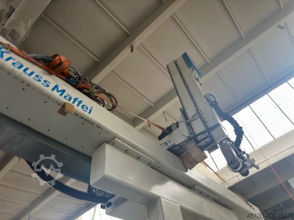 射出成形機 KraussMaffei KM 400-3000 GX Blue Power mit dem Robot
