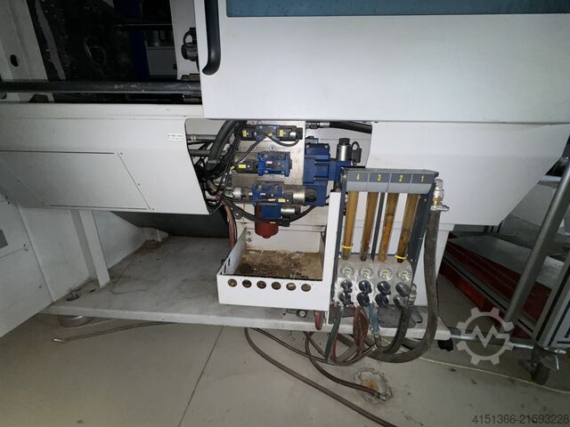 Máquina de moldagem por injeção BATTENFELD HM65/210 UNILOG B6P