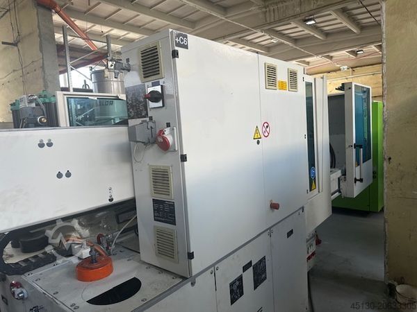 Mesin cetak injeksi KraussMaffei KM 130-750 CX PolySet