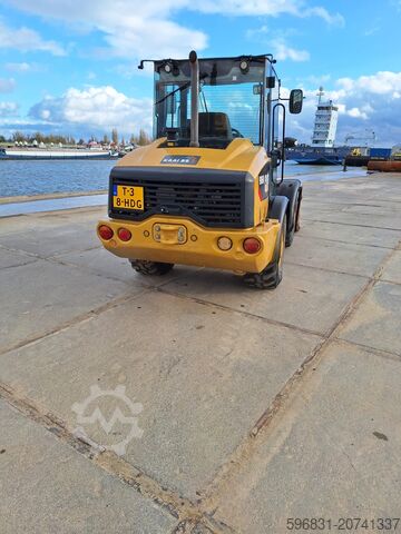 τροχοφόρος φορτωτής Caterpillar 906M