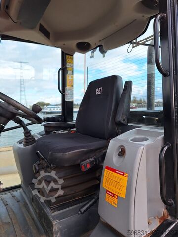 τροχοφόρος φορτωτής Caterpillar 906M