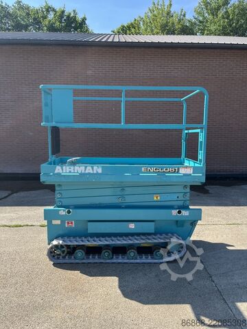 Plataforma elevadora de tijera sobre orugas usada Airman ENCL.061 AIRMAN ENCL.061
