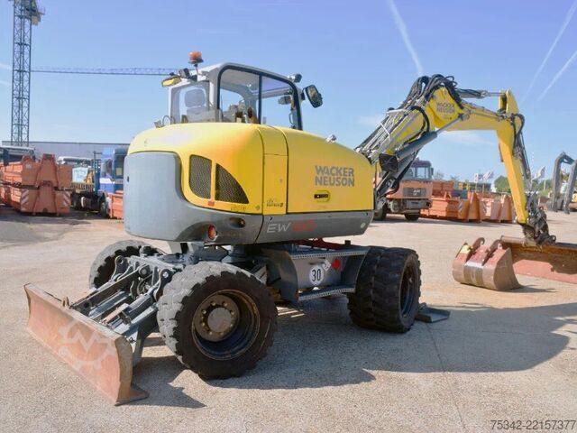 Hjólagröfu WACKER NEUSON EW100 wheel-excavator Model E06-06