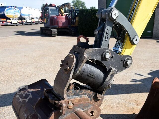 Hjólagröfu WACKER NEUSON EW100 wheel-excavator Model E06-06