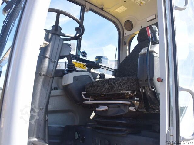 Hjólagröfu WACKER NEUSON EW100 wheel-excavator Model E06-06