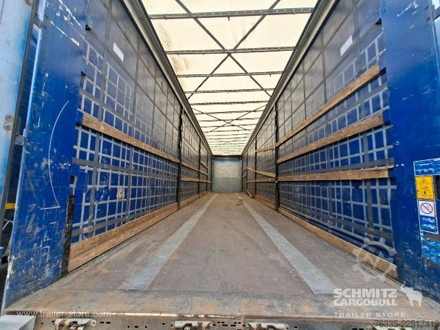 Avoin puoliperävaunu pressulla Kögel Curtainsider Mega