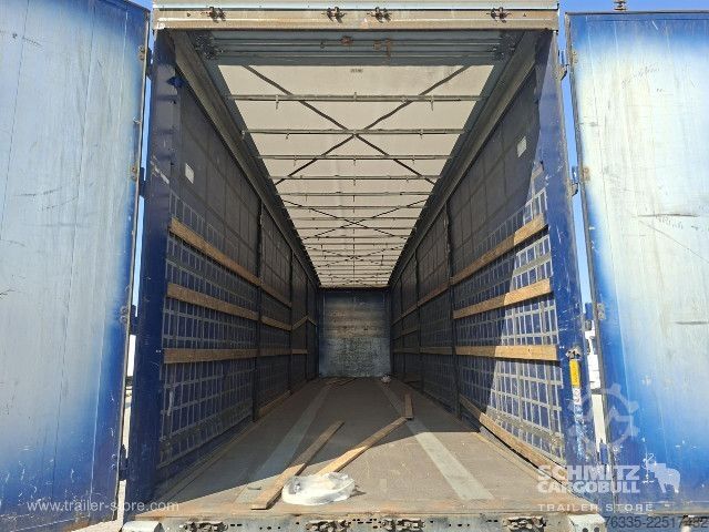 Avoin puoliperävaunu pressulla Kögel Curtainsider Mega
