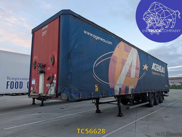 Rennandi presenningar Fruehauf