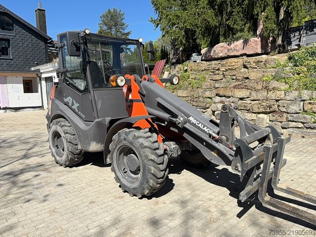 Máy xúc Mecalac Ax 850 with forks and loader-bucket