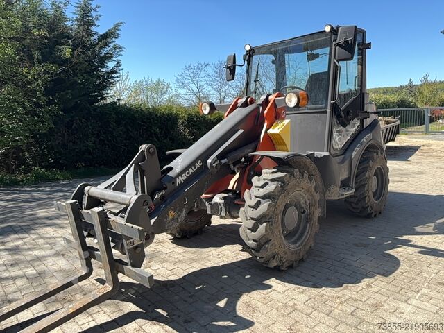 Máy xúc Mecalac Ax 850 with forks and loader-bucket