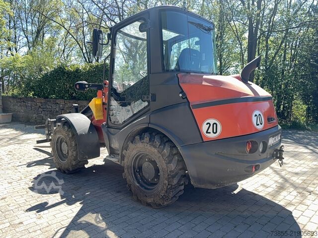 Máy xúc Mecalac Ax 850 with forks and loader-bucket