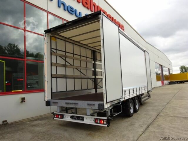 Open trailer with tarp Möslein TPW 105 D Schwebheim Tandem- Planenanhänger Durchladen