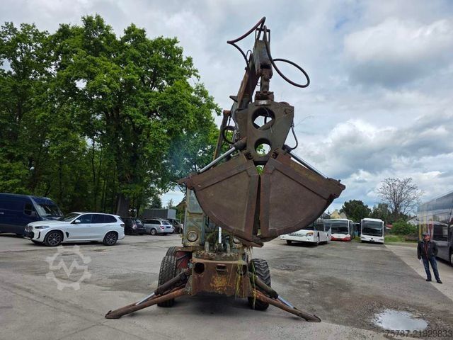 Točkaš bager  Craiova IH Radbagger ( Romania ) mit 2 Schalengr