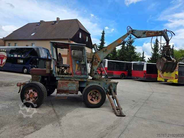 Točkaš bager  Craiova IH Radbagger ( Romania ) mit 2 Schalengr