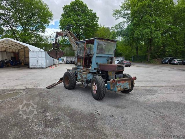 Točkaš bager  Craiova IH Radbagger ( Romania ) mit 2 Schalengr