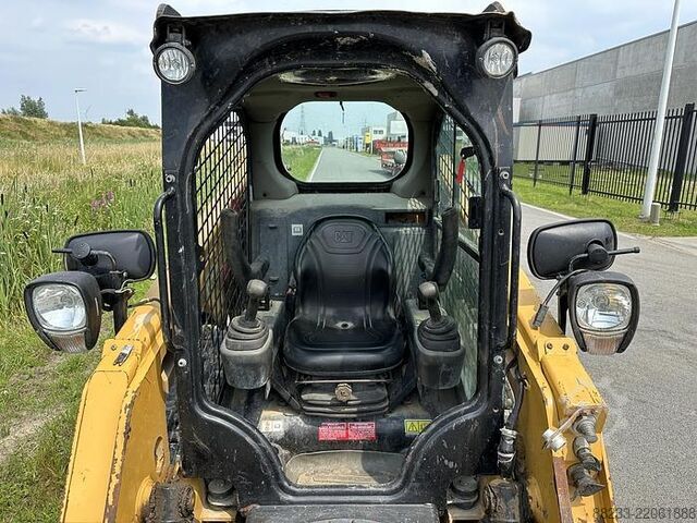 Penggali roda rantai Caterpillar 239D