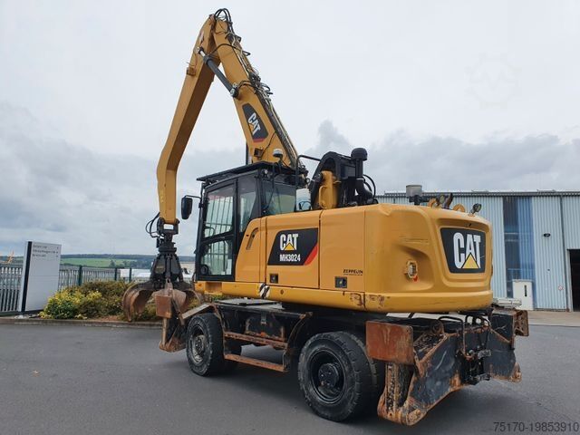 حفار متحرك CATERPILLAR MH3024 / MH 3024 / Greifer / 2018 / 9.424h