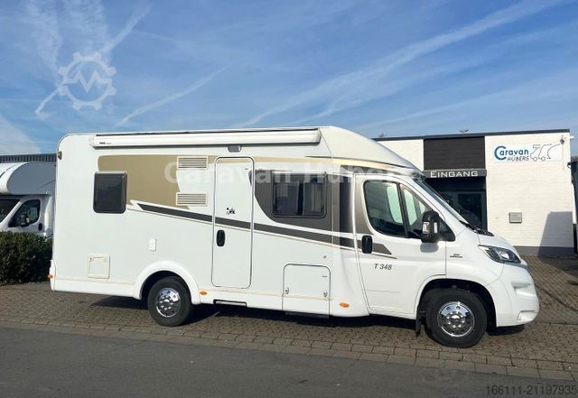 Semi-integrated camper CARADO T 348 - Hub/Festbett - Klima - Garage -