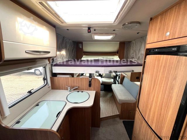 Semi-integrated camper CARADO T 348 - Hub/Festbett - Klima - Garage -
