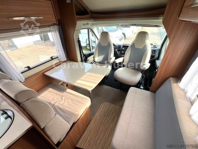 Semi-integrated camper CARADO T 348 - Hub/Festbett - Klima - Garage -