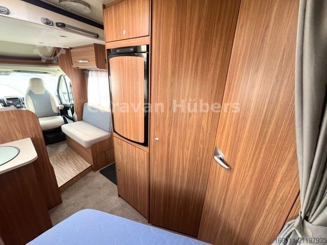 Semi-integrated camper CARADO T 348 - Hub/Festbett - Klima - Garage -