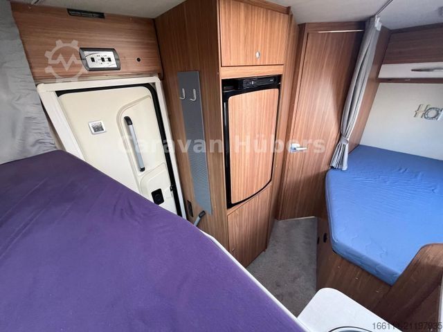 Semi-integrated camper CARADO T 348 - Hub/Festbett - Klima - Garage -